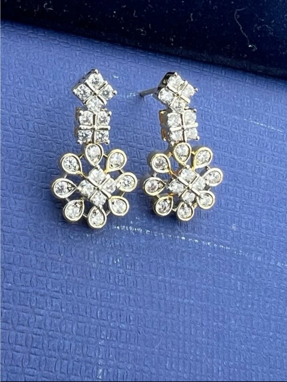 Two tone rhodium plated floral earrings on silver with clear swarovski elements